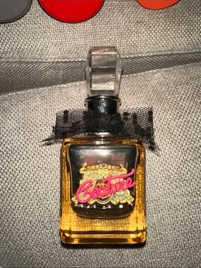 Juicy Couture Amber Perfume Bottle with Pink Logo & Black Lace